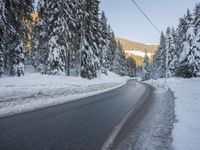 German Alps Winter Morning: A Road Through Snowy Mountains