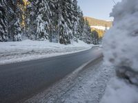 German Alps Winter Morning: A Road Through Snowy Mountains