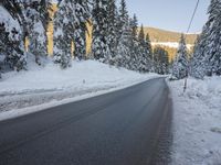 German Alps Winter Morning: A Road Through Snowy Mountains