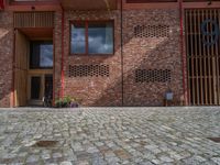 German Brick Wall and Cobblestone Road