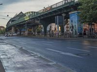 the view under the highway, on a rainy day of the city street and on the streets with buildings and bicycles