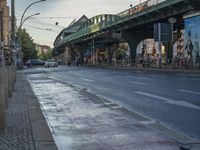 the view under the highway, on a rainy day of the city street and on the streets with buildings and bicycles