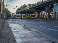 the view under the highway, on a rainy day of the city street and on the streets with buildings and bicycles