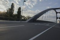German City at Dawn with Motion Blur on Bridge