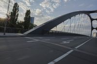 German City at Dawn with Motion Blur on Bridge