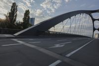 German City at Dawn with Motion Blur on Bridge