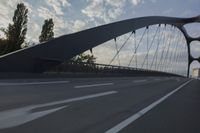 German City at Dawn with Motion Blur on Bridge