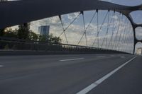 German City at Dawn with Motion Blur on Bridge