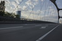 German City at Dawn with Motion Blur on Bridge