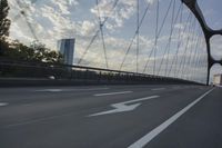German City at Dawn with Motion Blur on Bridge