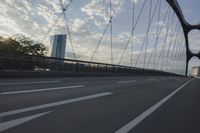 German City at Dawn with Motion Blur on Bridge
