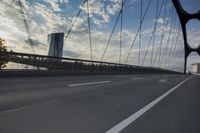 German City at Dawn with Motion Blur on Bridge