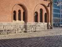 the stone is cobbled in to the street with railings that allow additional support