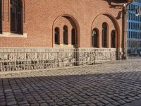 the stone is cobbled in to the street with railings that allow additional support
