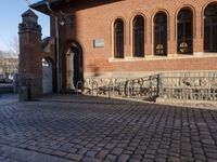 the stone is cobbled in to the street with railings that allow additional support