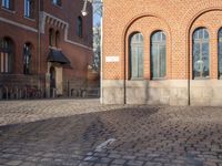 the stone is cobbled in to the street with railings that allow additional support