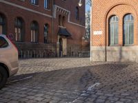 the stone is cobbled in to the street with railings that allow additional support