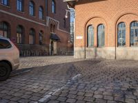 the stone is cobbled in to the street with railings that allow additional support