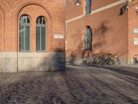 the stone is cobbled in to the street with railings that allow additional support
