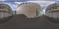 360 - view of an outside courtyard with a building and the sky as a background