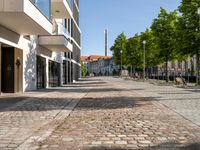 a large building has many windows and doors on both sides of the walkways, which also look very nice