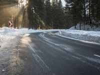 German Highway: Wet Road and Snow in the Alps