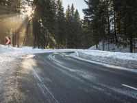 German Highway: Wet Road and Snow in the Alps