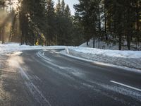 German Highway: Wet Road and Snow in the Alps