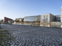 the brick sidewalk is laid to look like the ground of the waterfront area of a city