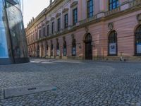 German Museum: Glass Walls and Cobblestone Streets