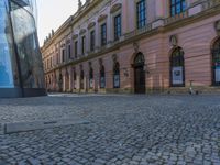 German Museum: Glass Walls and Cobblestone Streets