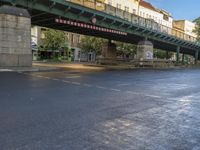 the view under the highway, on a rainy day of the city street and on the streets with buildings and bicycles