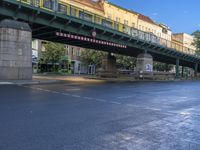 the view under the highway, on a rainy day of the city street and on the streets with buildings and bicycles