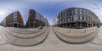 three pictures showing traffic passing in the same direction of intersection, with many buildings in both directions of intersection