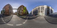 a view from the side with two different angles of a street from different angles in front and across