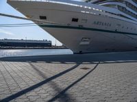 this is an image of the ship docked in the harbor docks with water around it