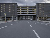 the car park is empty and empty at dusk as a traffic light is set on