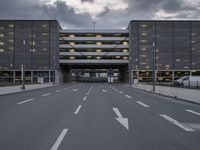 the car park is empty and empty at dusk as a traffic light is set on