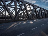 Daytime in Germany: Asphalt Road Bathed in Sunshine and Clear Sky