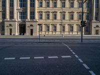 two lanes that appear to be in the middle of the road, and are straight lines to the left