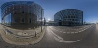 a street view looking towards the street and an image of a building, taken from the side