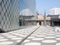 there is a very large building with polka dots all over it's surface and architecture