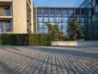 a building has wood slat fencing around the perimeter of it, to prevent predators