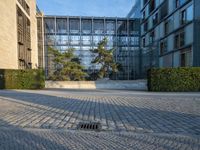 a building has wood slat fencing around the perimeter of it, to prevent predators