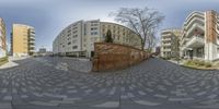 an 360 - ray view of the streets of a city with buildings and apartment blocks