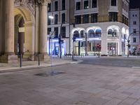 Night View of Germany: Town Square Illuminated with Artificial Light