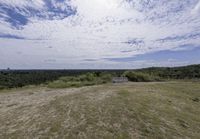 Germany's Park: Grassy Hills under Cloudy Skies