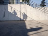a man riding a skateboard up the side of a ramp while holding onto a bag