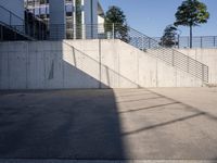 a man riding a skateboard up the side of a ramp while holding onto a bag