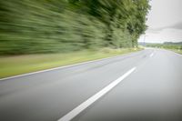 Road in Germany: A View of Asphalt and Clouds